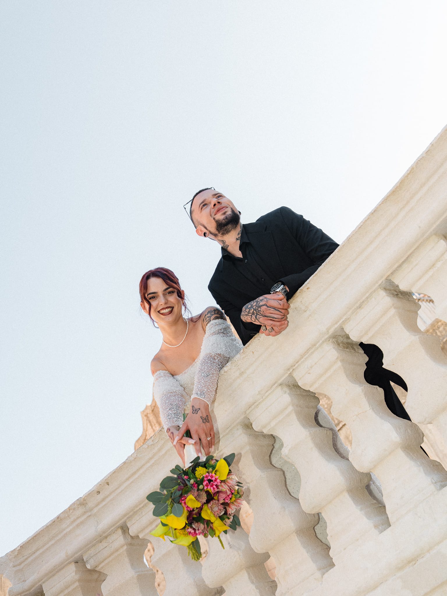 Intimate wedding moment in Croatia, bride and groom laughing naturally