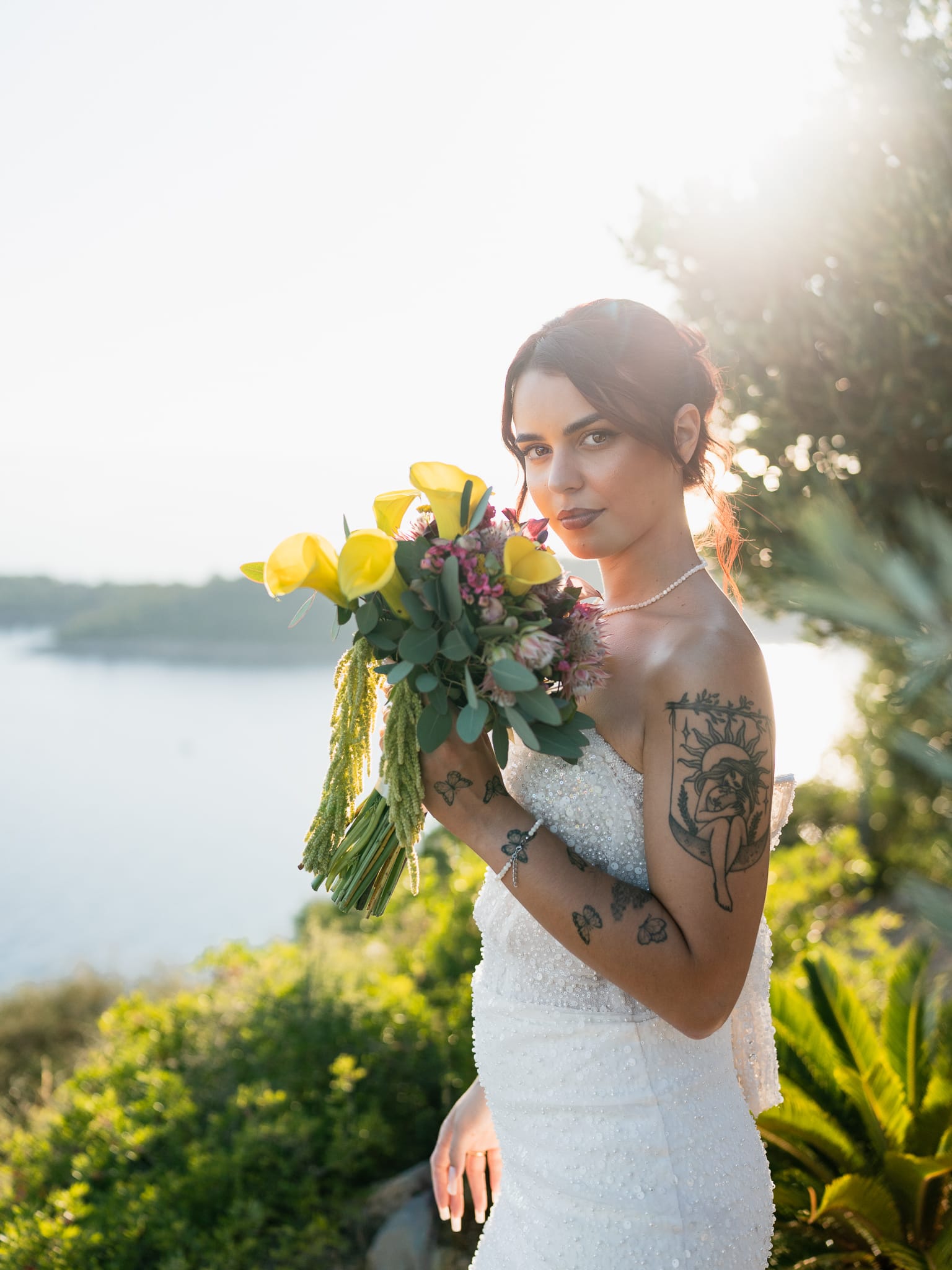 Beautiful bride moment in Dubrovnik, Croatia, holding flowers